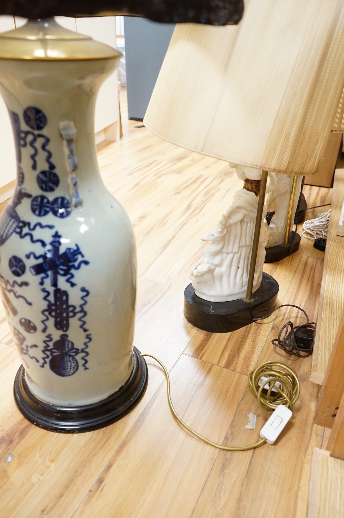 A 19th century Chinese underglaze blue celadon ground baluster vase, mounted as a table lamp, with Chinese silk embroidered shade, 112cm high including shade.